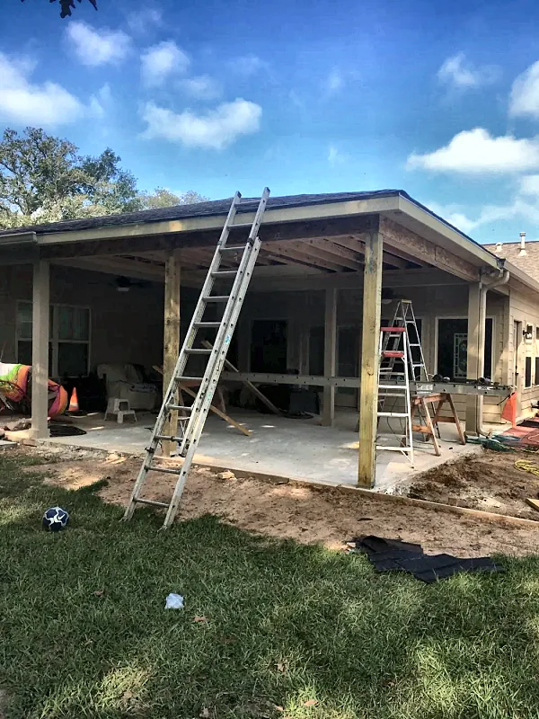 Covered patio with the roof framed, still under construction